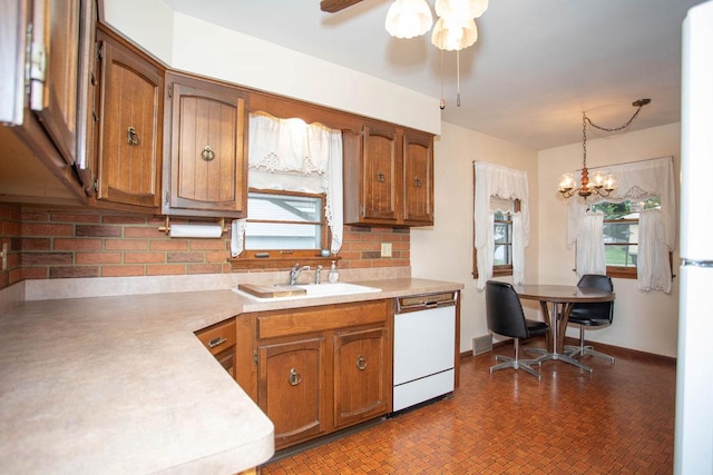 1705 California Ave E, Saint Paul, MN 55106 - kitchen featuring white appliances, brown cabinets, and plenty of natural light