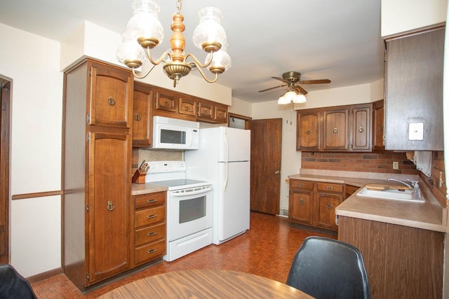 1705 California Ave E, Saint Paul, MN 55106 - kitchen with white appliances, backsplash, a chandelier, a ceiling fan, and brown cabinets