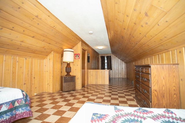 1705 California Ave E, Saint Paul, MN 55106 - bedroom featuring light floors, wooden walls, vaulted ceiling, and wooden ceiling