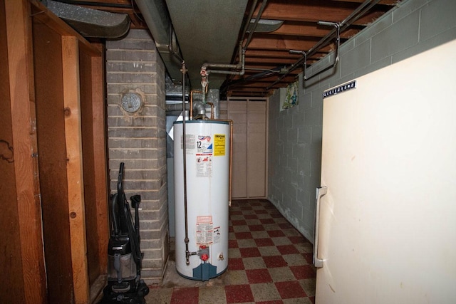 1705 California Ave E, Saint Paul, MN 55106 - unfinished basement with water heater, tile patterned floors, and concrete block wall