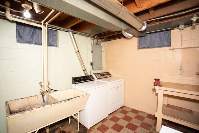 1705 California Ave E, Saint Paul, MN 55106 - laundry area featuring washer and dryer, electric panel, and tile patterned floors