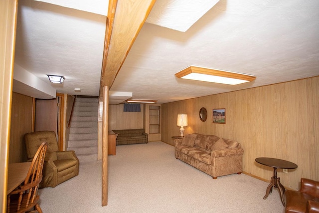 1705 California Ave E, Saint Paul, MN 55106 - carpeted living area featuring stairway and wood walls