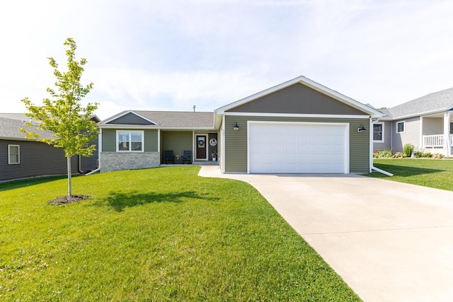 525 7th Ave NE, Plainview, MN 55964 - ranch-style home with an attached garage, concrete driveway, a front lawn, and stone siding