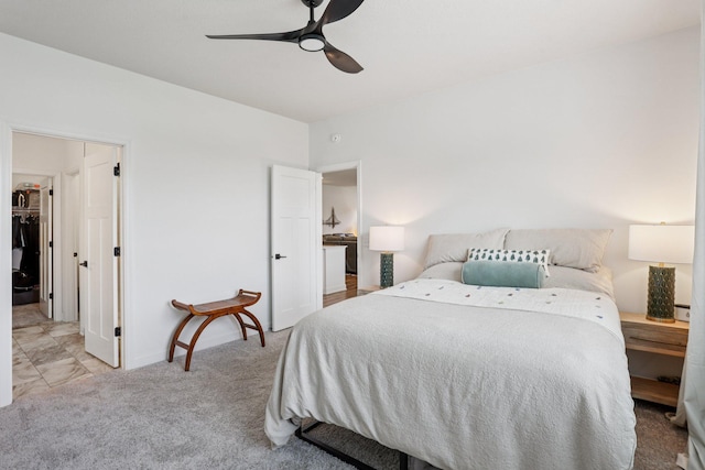 15101 Quince St NW, Andover, MN 55304 - carpeted bedroom featuring a walk in closet and a ceiling fan