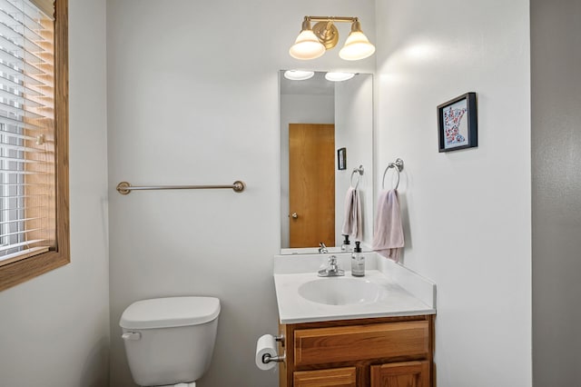 1358 Phalen Blvd, Saint Paul, MN 55106 - bathroom featuring toilet and vanity