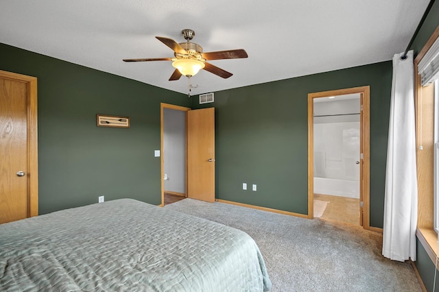 1358 Phalen Blvd, Saint Paul, MN 55106 - carpeted bedroom featuring ceiling fan and connected bathroom