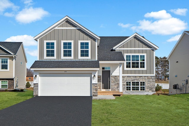 625 47th Ave NE, Saint Cloud, MN 56304 - craftsman inspired home featuring board and batten siding, driveway, a front yard, and an attached garage