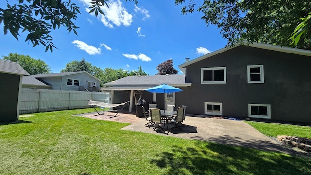 1515 3rd Ave NE, Owatonna, MN 55060 - fenced backyard with a patio area