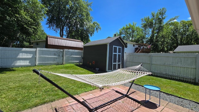 1515 3rd Ave NE, Owatonna, MN 55060 - fenced backyard with a storage unit