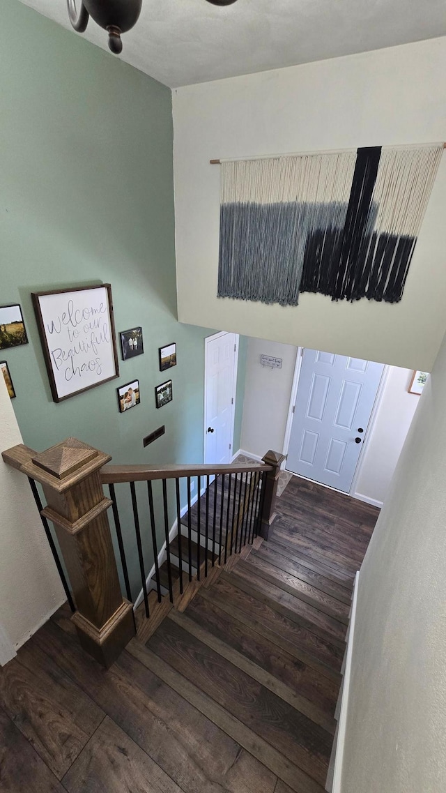 1515 3rd Ave NE, Owatonna, MN 55060 - stairs featuring wood finished floors and baseboards