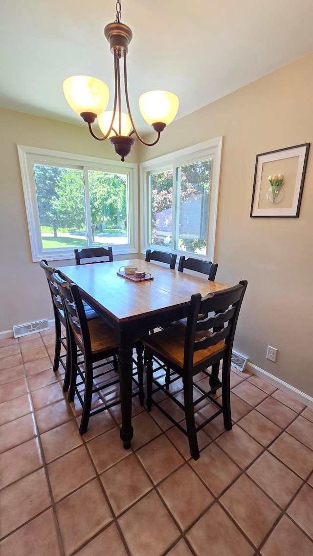 1515 3rd Ave NE, Owatonna, MN 55060 - dining room with light tile patterned floors