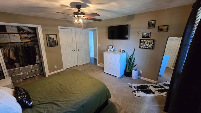 1515 3rd Ave NE, Owatonna, MN 55060 - bedroom featuring two closets, carpet flooring, and ceiling fan