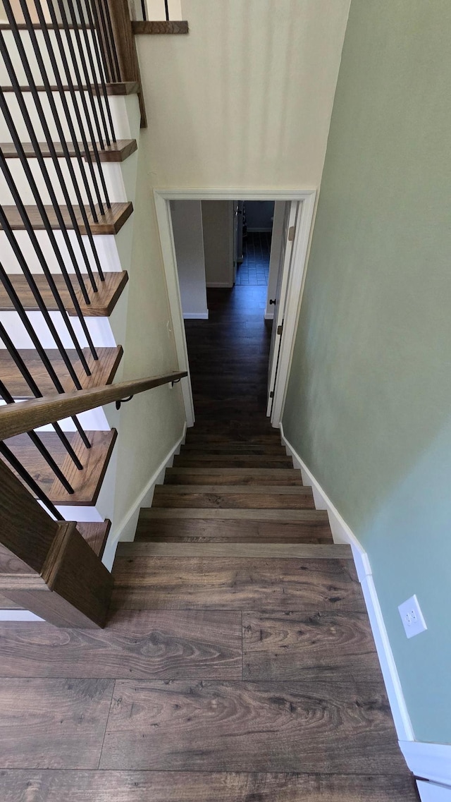 1515 3rd Ave NE, Owatonna, MN 55060 - stairs featuring wood finished floors and baseboards