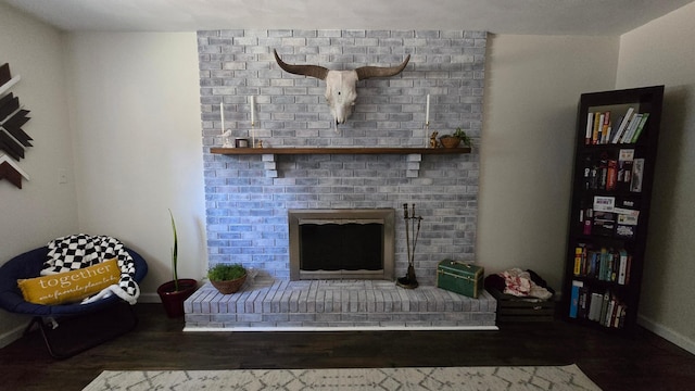 1515 3rd Ave NE, Owatonna, MN 55060 - living area featuring a fireplace and wood finished floors