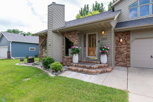2902 24th Ave S, Fargo, ND 58103 - entrance to property with a yard, brick siding, a chimney, a shingled roof, and driveway