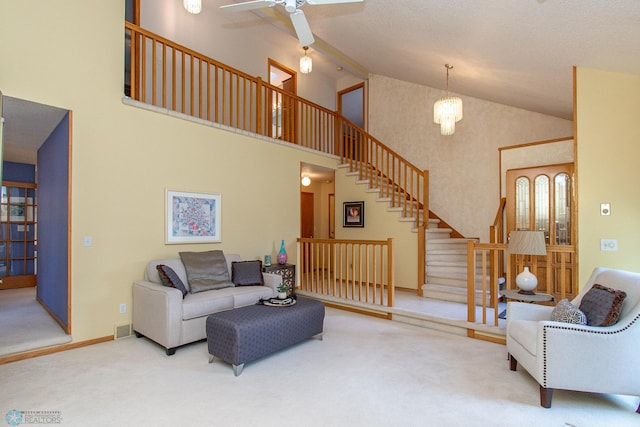 2902 24th Ave S, Fargo, ND 58103 - living area featuring stairs, high vaulted ceiling, carpet floors, and a ceiling fan