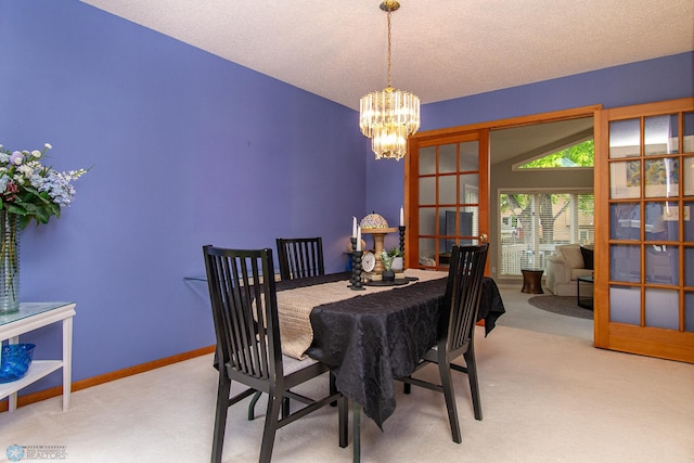 2902 24th Ave S, Fargo, ND 58103 - dining space featuring carpet floors and a chandelier