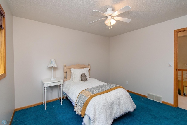 2902 24th Ave S, Fargo, ND 58103 - carpeted bedroom featuring baseboards and ceiling fan