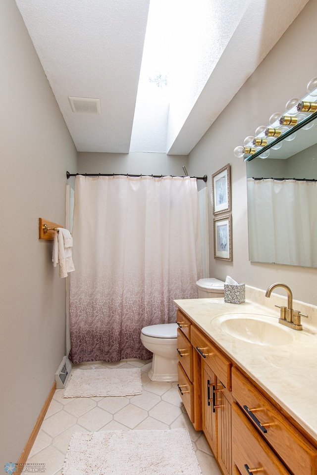 2902 24th Ave S, Fargo, ND 58103 - bathroom with vanity and tile patterned flooring