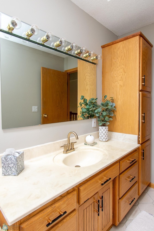 2902 24th Ave S, Fargo, ND 58103 - bathroom featuring vanity and tile patterned flooring