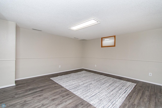 2902 24th Ave S, Fargo, ND 58103 - spare room featuring wood finished floors and a textured ceiling