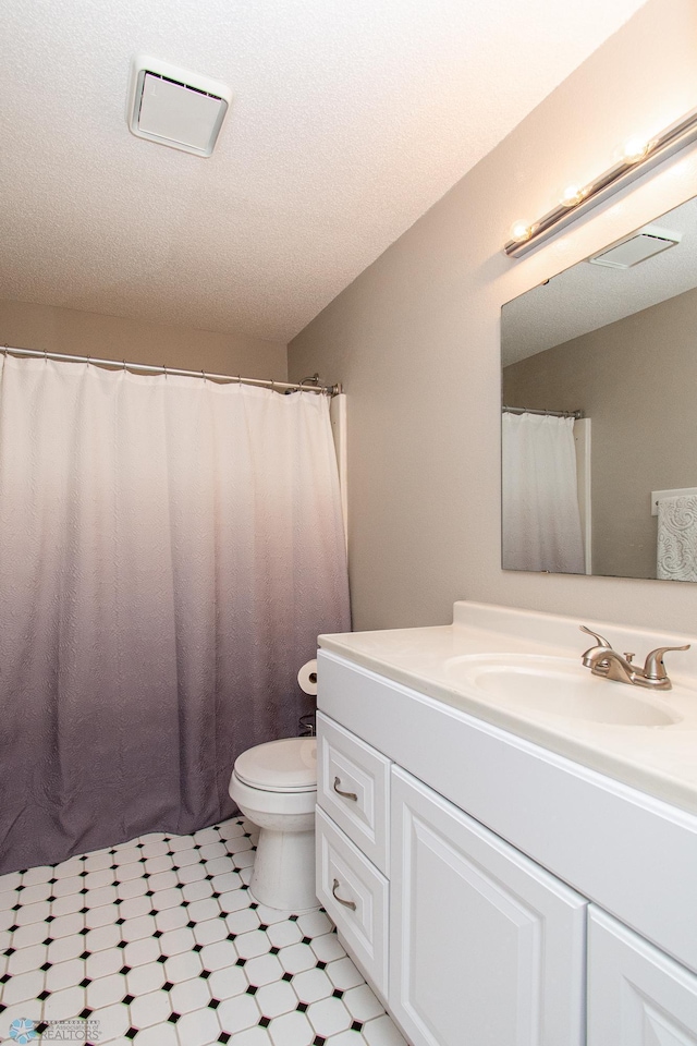 2902 24th Ave S, Fargo, ND 58103 - bathroom with tile patterned floors and vanity