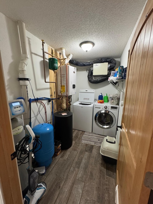 46313 St Lawrence Dr, Otto Twp, MN 56573 - laundry room featuring washing machine and clothes dryer, tankless water heater, wood-type flooring, and a textured ceiling