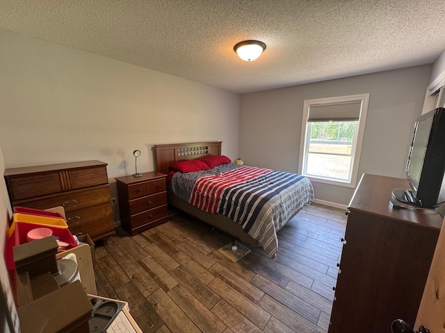 46313 St Lawrence Dr, Otto Twp, MN 56573 - bedroom featuring dark wood-style floors and a textured ceiling