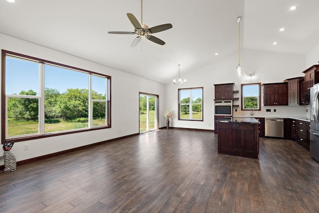 11039 285th Ave, Zimmerman, MN 55398 - kitchen with ceiling fan, a chandelier, dark brown cabinetry, open floor plan, and a center island