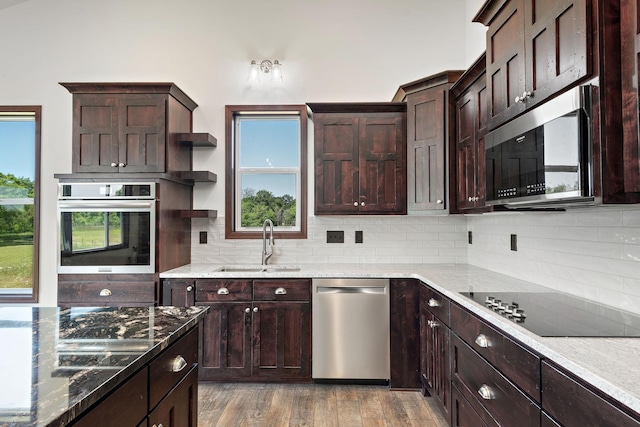 11039 285th Ave, Zimmerman, MN 55398 - kitchen featuring stainless steel appliances, backsplash, open shelves, and dark brown cabinetry