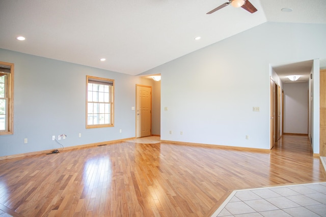 66182 310th Ave, Lake City, MN 55041 - spare room with healthy amount of natural light, vaulted ceiling, light wood finished floors, a ceiling fan, and recessed lighting
