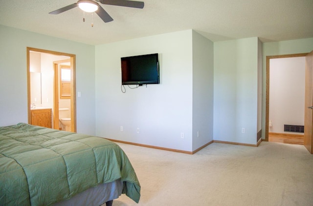 66182 310th Ave, Lake City, MN 55041 - carpeted bedroom with ensuite bath and a ceiling fan