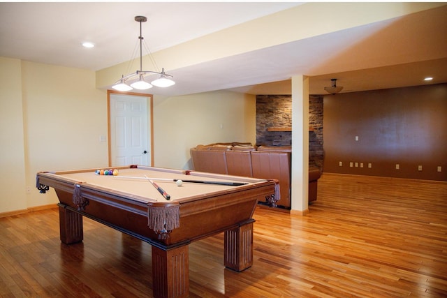 66182 310th Ave, Lake City, MN 55041 - game room with light wood-style flooring, a stone fireplace, billiards, and recessed lighting