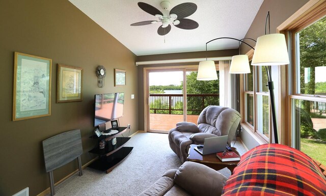 410 Pospeck Ln, Hoyt Lakes, MN 55750 - carpeted living room featuring lofted ceiling and a ceiling fan