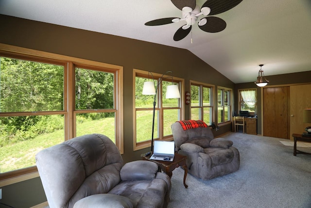 410 Pospeck Ln, Hoyt Lakes, MN 55750 - carpeted living area featuring plenty of natural light, vaulted ceiling, and ceiling fan