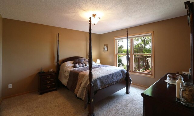 410 Pospeck Ln, Hoyt Lakes, MN 55750 - carpeted bedroom featuring a textured ceiling