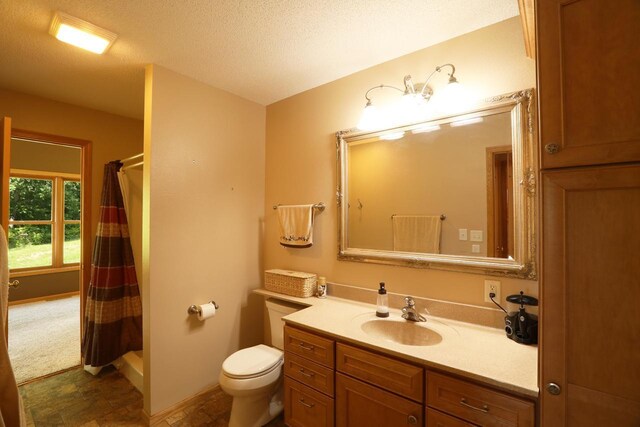 410 Pospeck Ln, Hoyt Lakes, MN 55750 - bathroom featuring vanity, a shower with curtain, and a textured ceiling