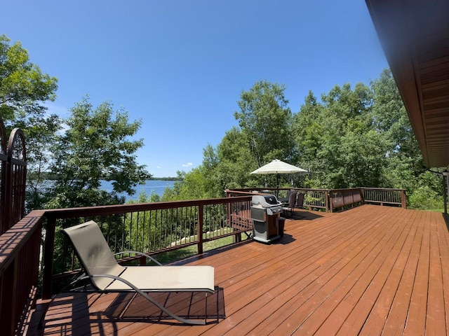 410 Pospeck Ln, Hoyt Lakes, MN 55750 - wooden terrace with area for grilling and a water view