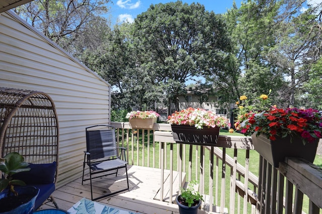 12190 Drake St NW, Coon Rapids, MN 55448 - wooden terrace with a lawn