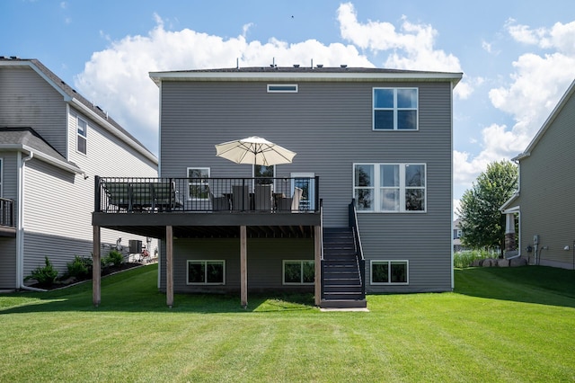 3702 112th Cir NE, Blaine, MN 55449 - rear view of house with a deck, stairway, and a lawn