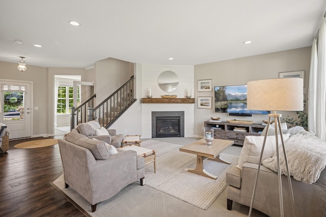 3702 112th Cir NE, Blaine, MN 55449 - living room with recessed lighting, a large fireplace, wood finished floors, and stairway
