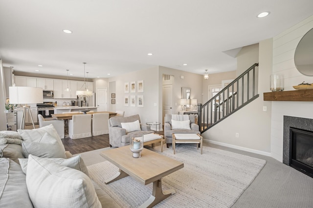 3702 112th Cir NE, Blaine, MN 55449 - living room featuring recessed lighting, stairs, and a fireplace