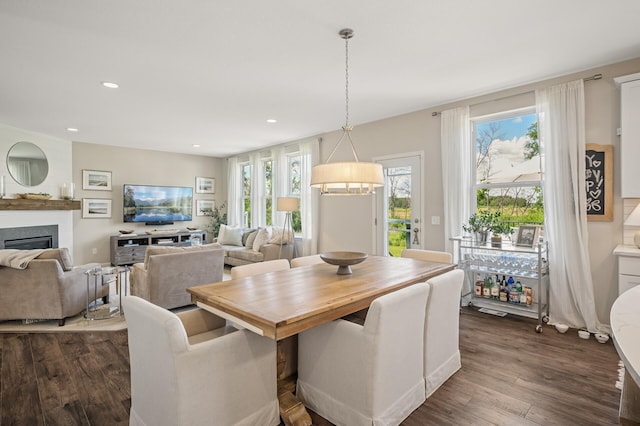 3702 112th Cir NE, Blaine, MN 55449 - dining area with a fireplace, dark wood-style floors, and recessed lighting
