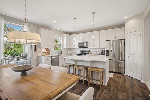 3702 112th Cir NE, Blaine, MN 55449 - dining area with dark wood-style floors and recessed lighting