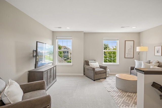 3702 112th Cir NE, Blaine, MN 55449 - living area with light colored carpet, healthy amount of natural light, and recessed lighting