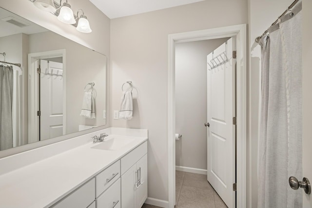 3702 112th Cir NE, Blaine, MN 55449 - full bath with vanity, tile patterned floors, and a shower with curtain