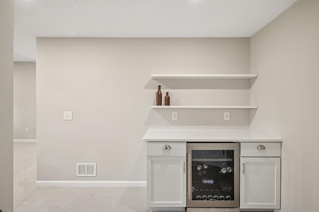 3702 112th Cir NE, Blaine, MN 55449 - indoor dry bar featuring beverage cooler and carpet