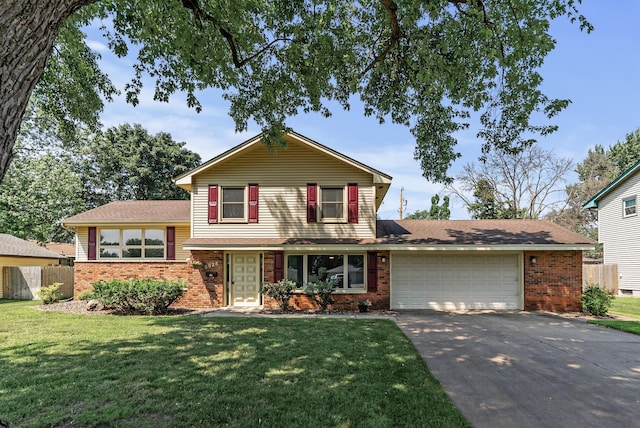 6925 Colorado Ave N, Brooklyn Park, MN 55429 - tri-level home with brick siding, concrete driveway, an attached garage, and roof with shingles