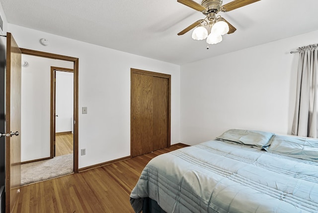 6925 Colorado Ave N, Brooklyn Park, MN 55429 - bedroom with wood finished floors, a closet, and ceiling fan