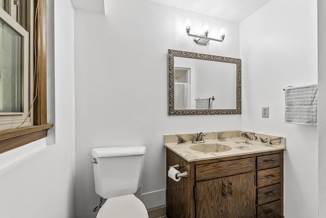 6925 Colorado Ave N, Brooklyn Park, MN 55429 - bathroom featuring vanity and toilet